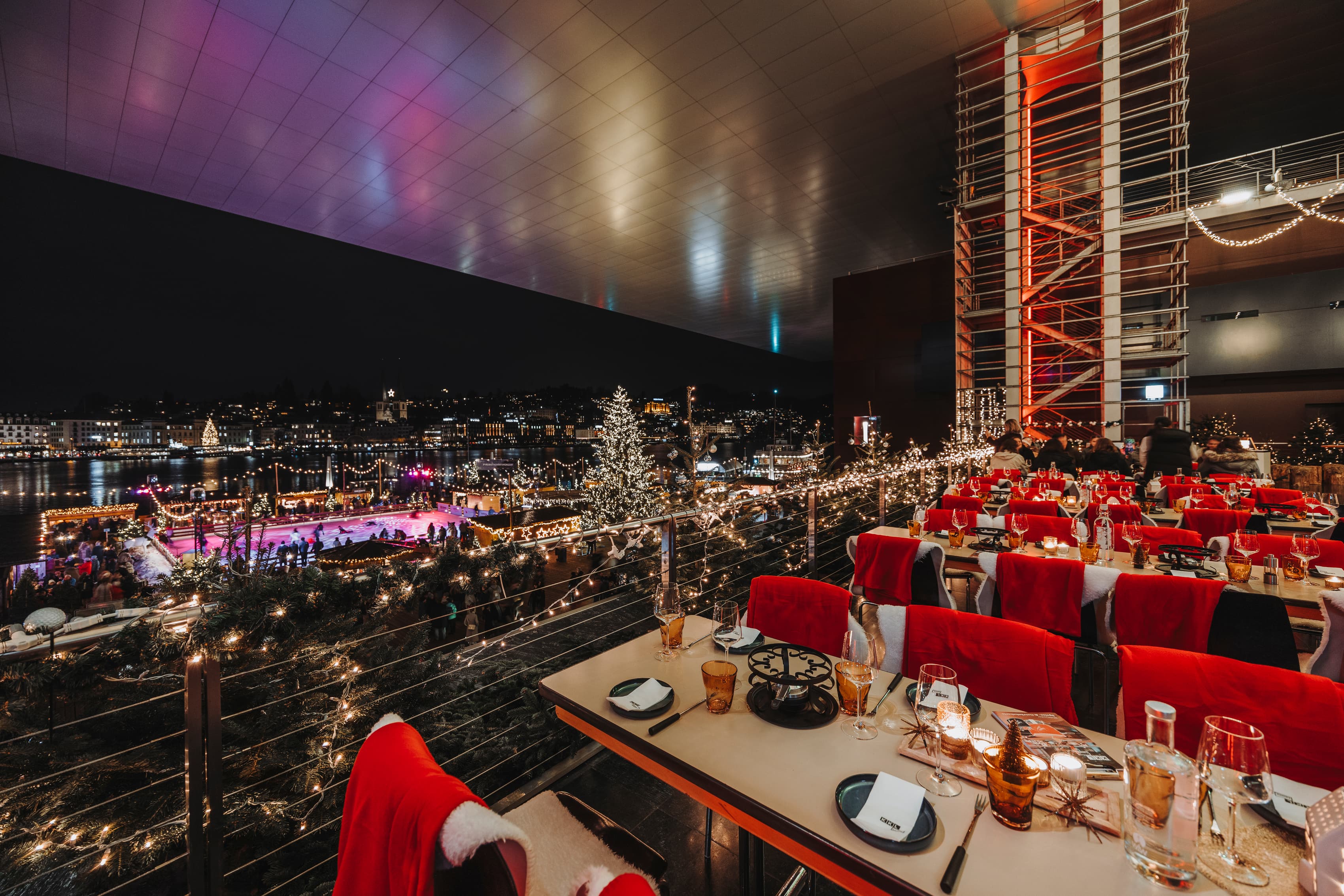 Winter Wonderland at the KKL Luzern with a view over the ice rink and the city of Lucerne